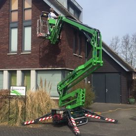 Groene hoogwerker